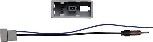 Metra 40-NI12 antenna adapter installed in a Nissan dashboard